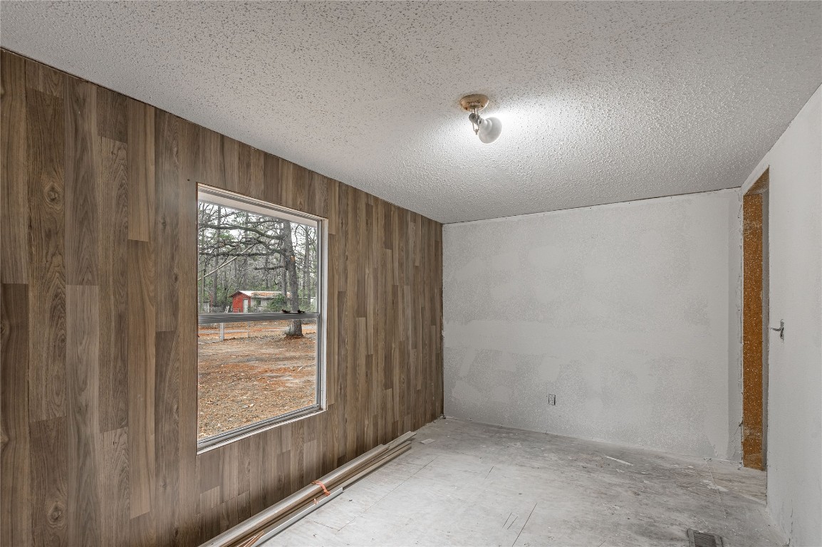 163 Magnolia Court Trinity, TX 75862 - Photo 21 of 25 a view of an empty room with a window