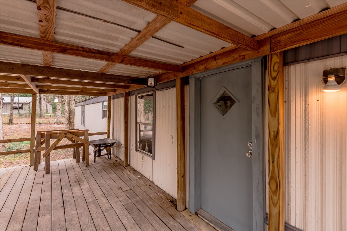 163 Magnolia Court Trinity, TX 75862 - Photo 5 of 25 a view of dining room with wooden floor