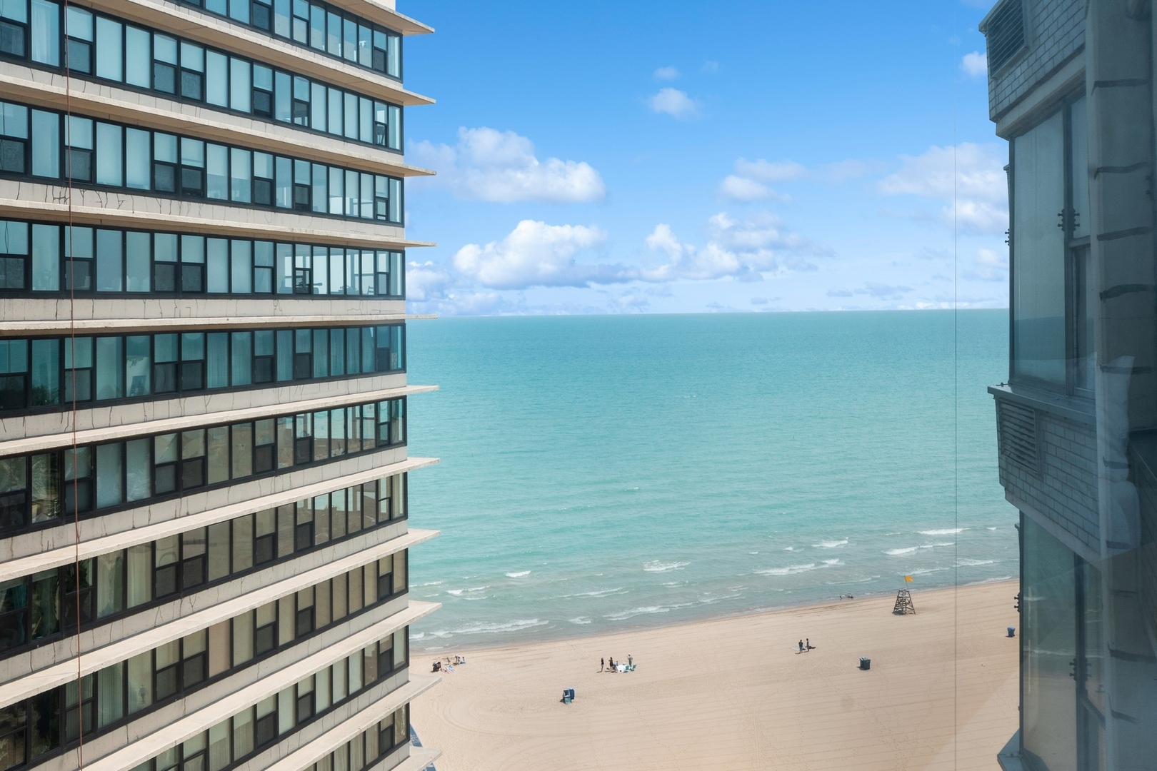 5757 North Sheridan Road, Unit 15G Chicago, IL 60660 - Photo 11 of 18 a view of a lake with building in front of it