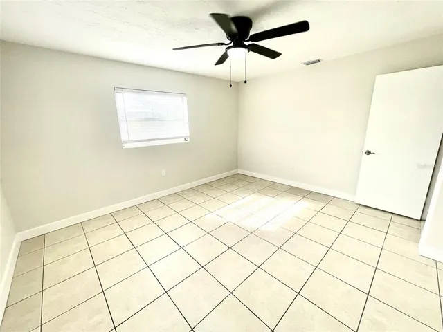 a bathroom with a sink a toilet and bathtub