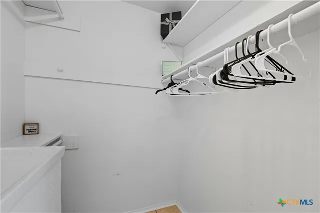 a bathroom with a sink and a shower