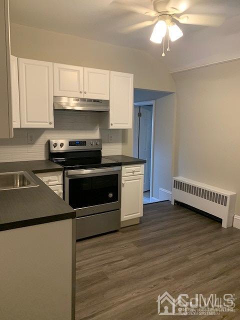 26 Mill Road Edison, NJ 08817 - Photo 8 of 26 a kitchen with stainless steel appliances a stove a sink and a refrigerator
