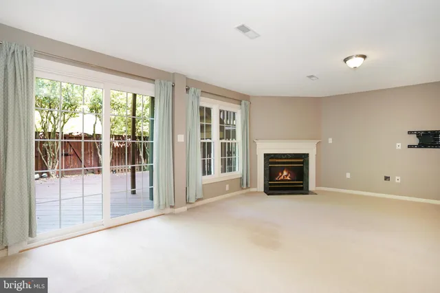 a view of livingroom with a fireplace
