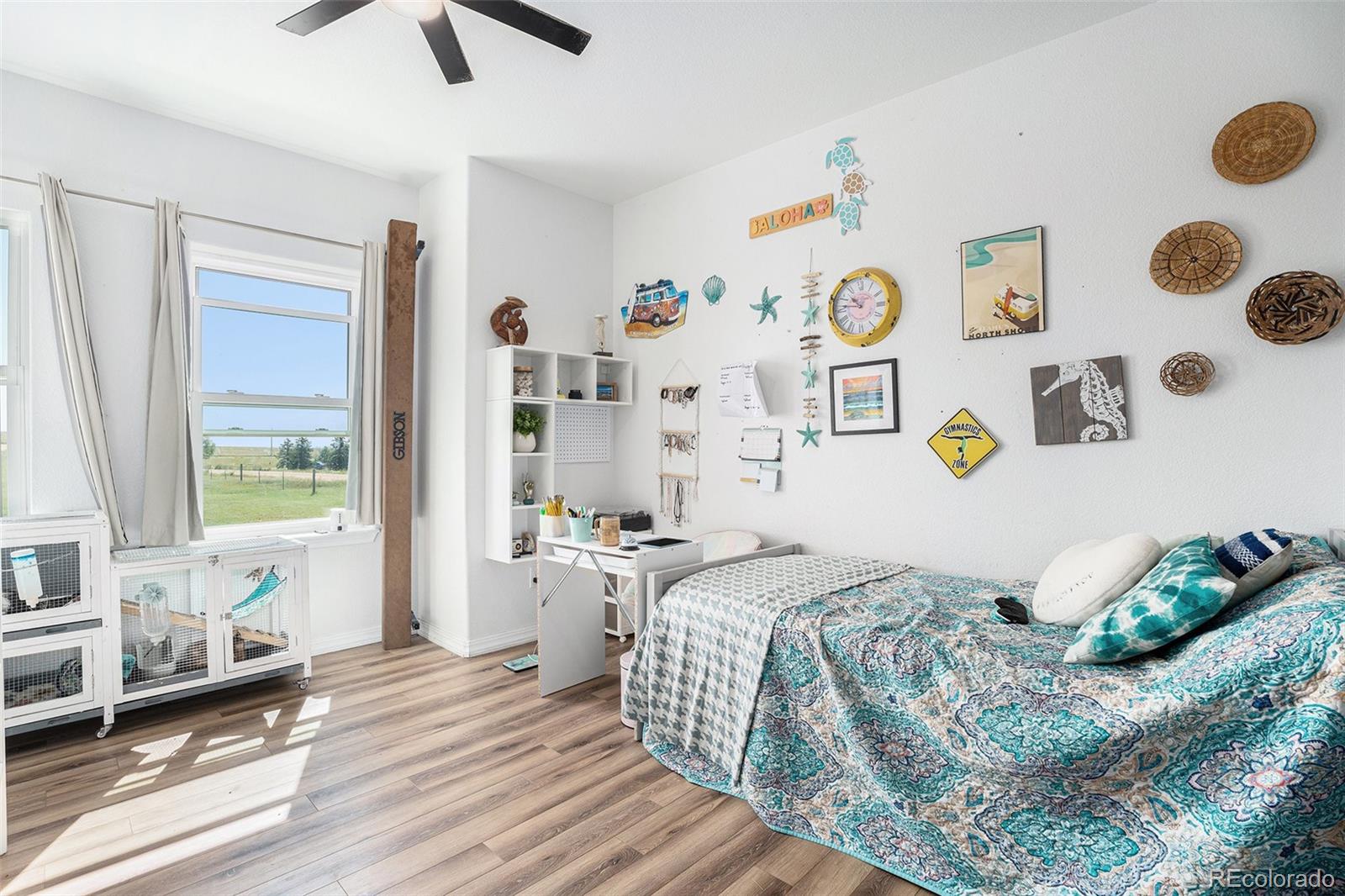 16690 Rabbit Track Trail Colorado Springs, CO 80930 - Photo 15 of 25 a bedroom with a bed and a window