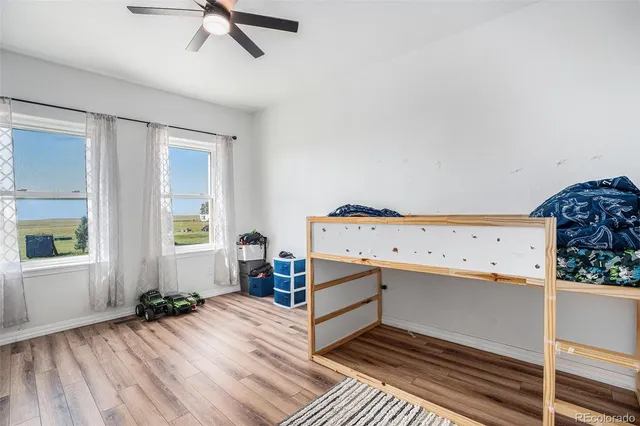 a bedroom with a bed and a view of bathroom