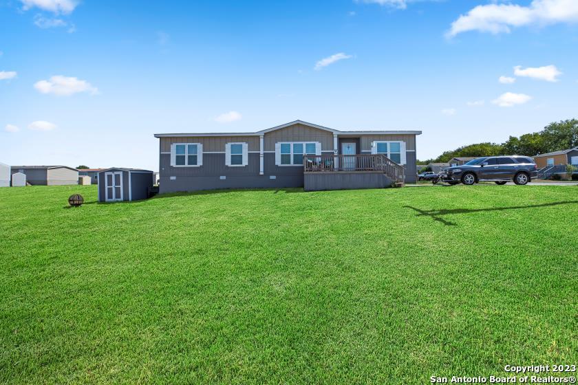 a house view with a garden space