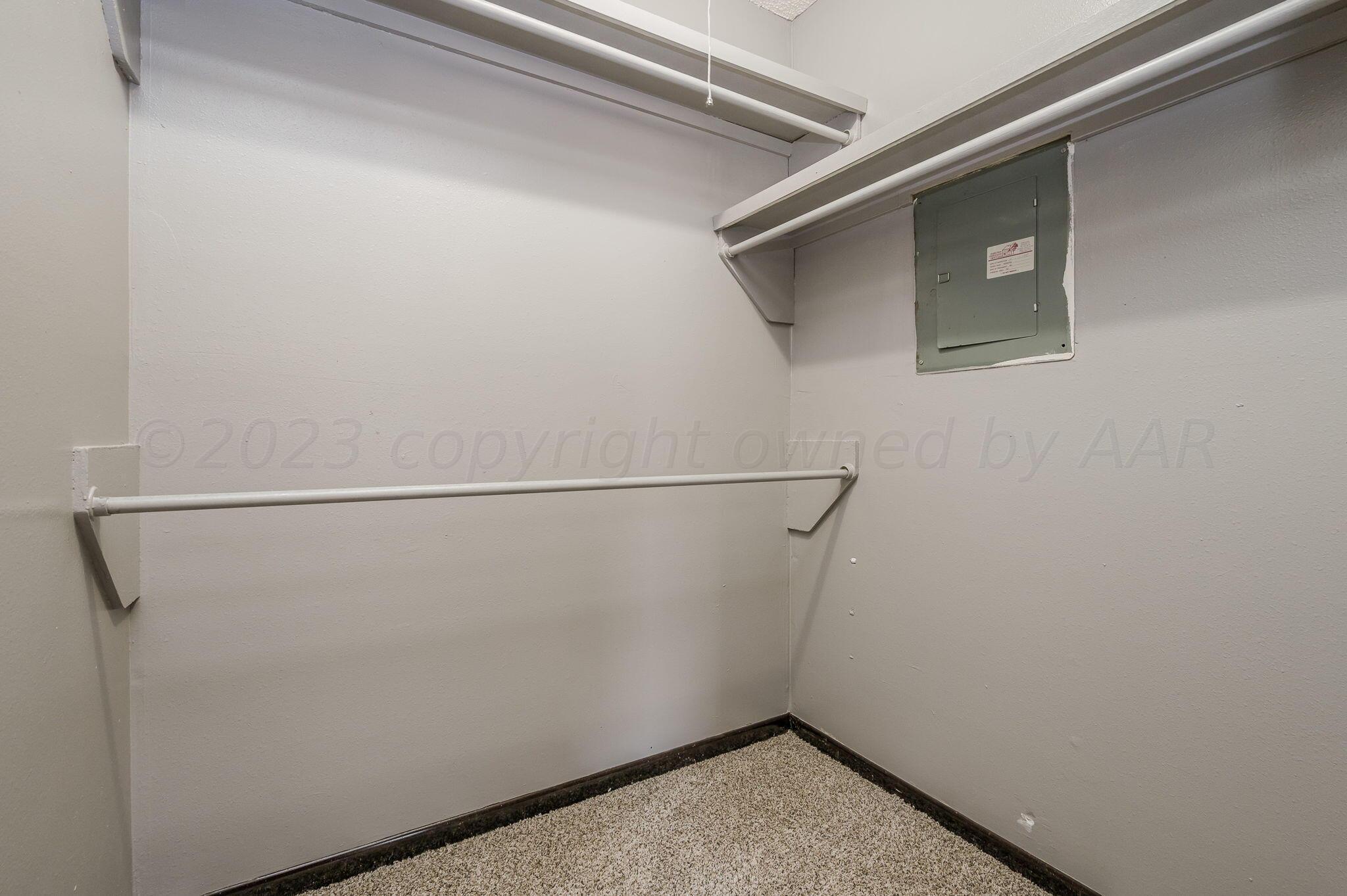 1909 Howard Drive Amarillo, TX 79106 - Photo 13 of 19 a view of small space with racks on the wall