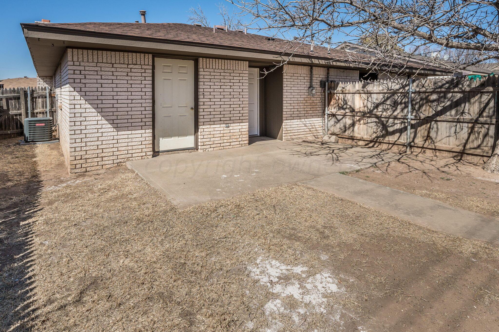 1909 Howard Drive Amarillo, TX 79106 - Photo 19 of 19 front view of a house with a large window