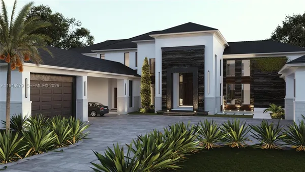 a front view of a house with a garden