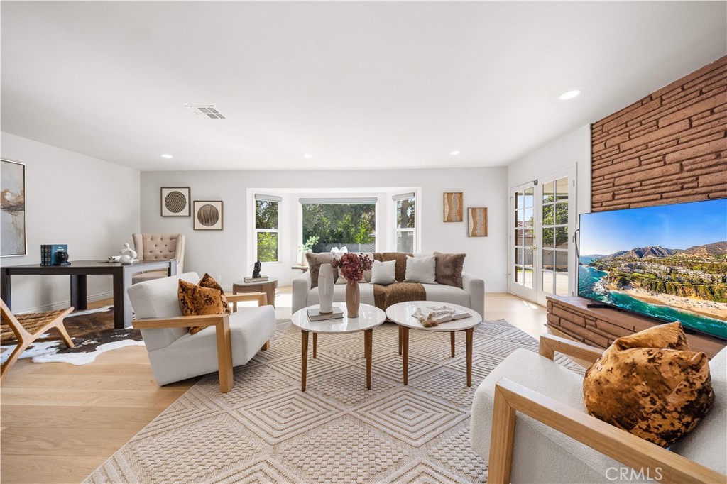240 Longley Way Arcadia, CA 91007 - Photo 17 of 50 a living room with furniture and a window