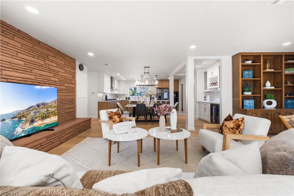 240 Longley Way Arcadia, CA 91007 - Photo 18 of 50 a living room with furniture and a fireplace