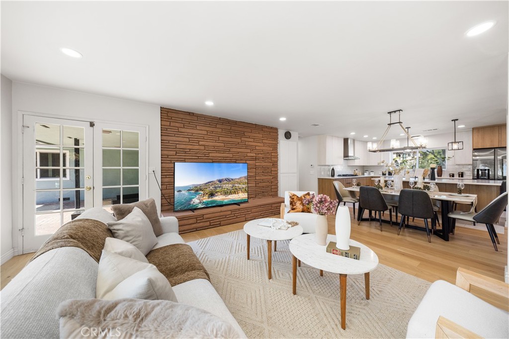 240 Longley Way Arcadia, CA 91007 - Photo 19 of 50 a living room with furniture and a flat screen tv