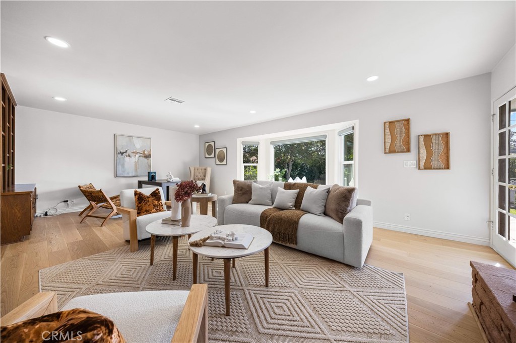 240 Longley Way Arcadia, CA 91007 - Photo 20 of 50 a living room with furniture and a table