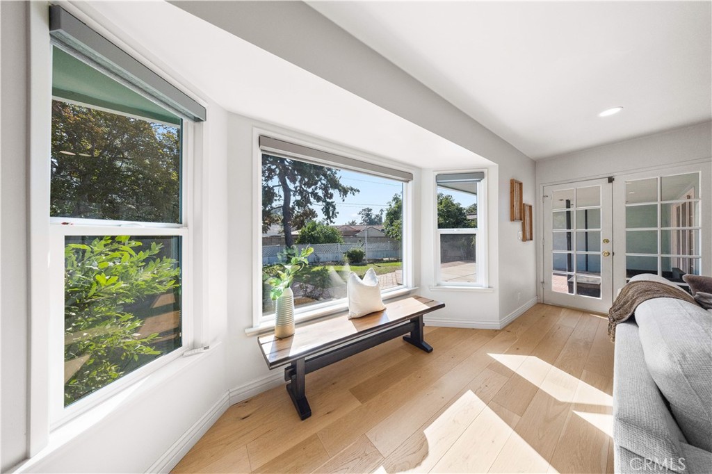 240 Longley Way Arcadia, CA 91007 - Photo 22 of 50 a living room with furniture and large windows