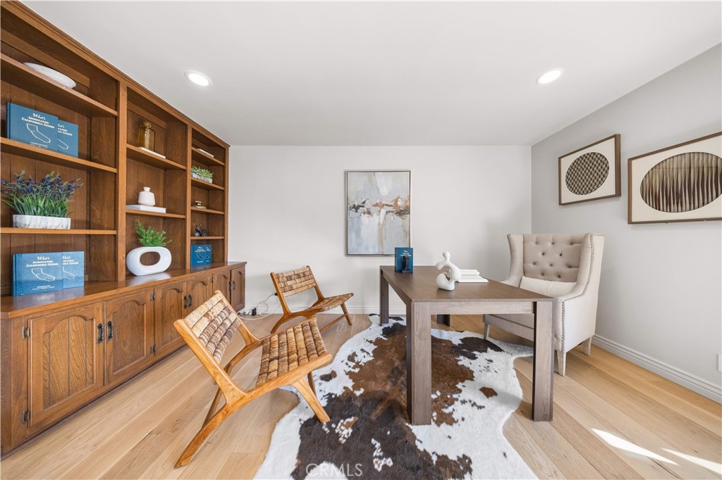 240 Longley Way Arcadia, CA 91007 - Photo 23 of 50 a view of a workspace with furniture and wooden floor