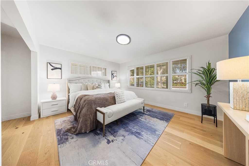 240 Longley Way Arcadia, CA 91007 - Photo 26 of 50 a bedroom with a large bed and a couch