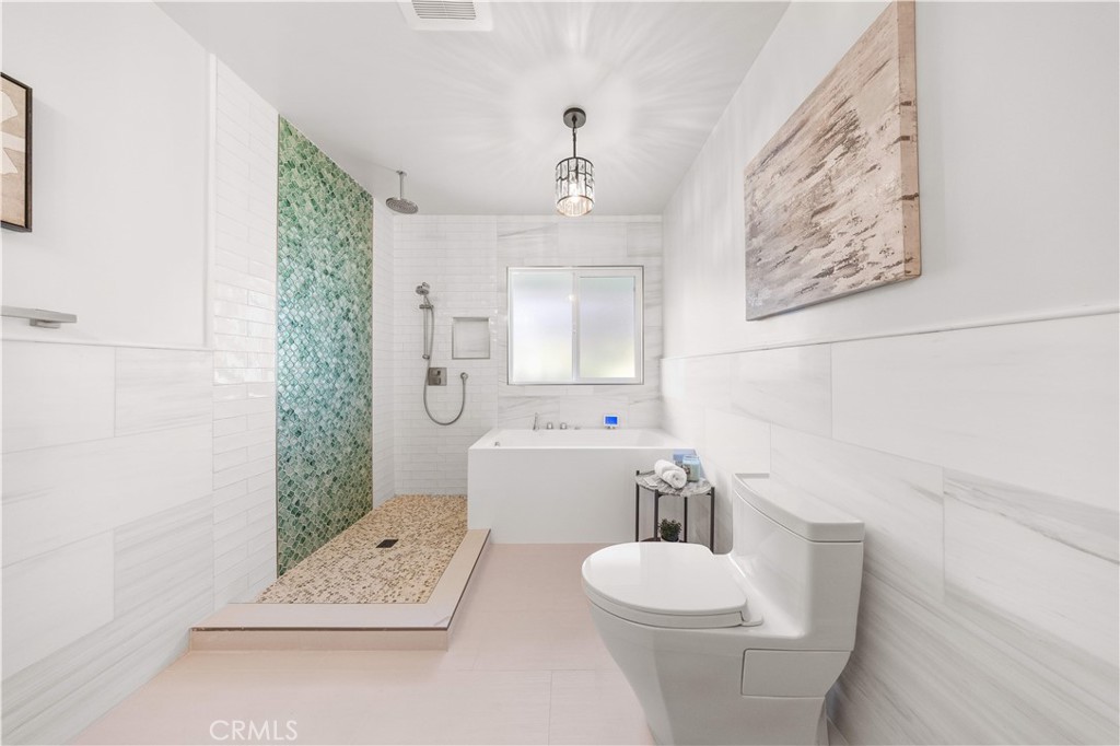 240 Longley Way Arcadia, CA 91007 - Photo 27 of 50 a bathroom with a sink a toilet and shower