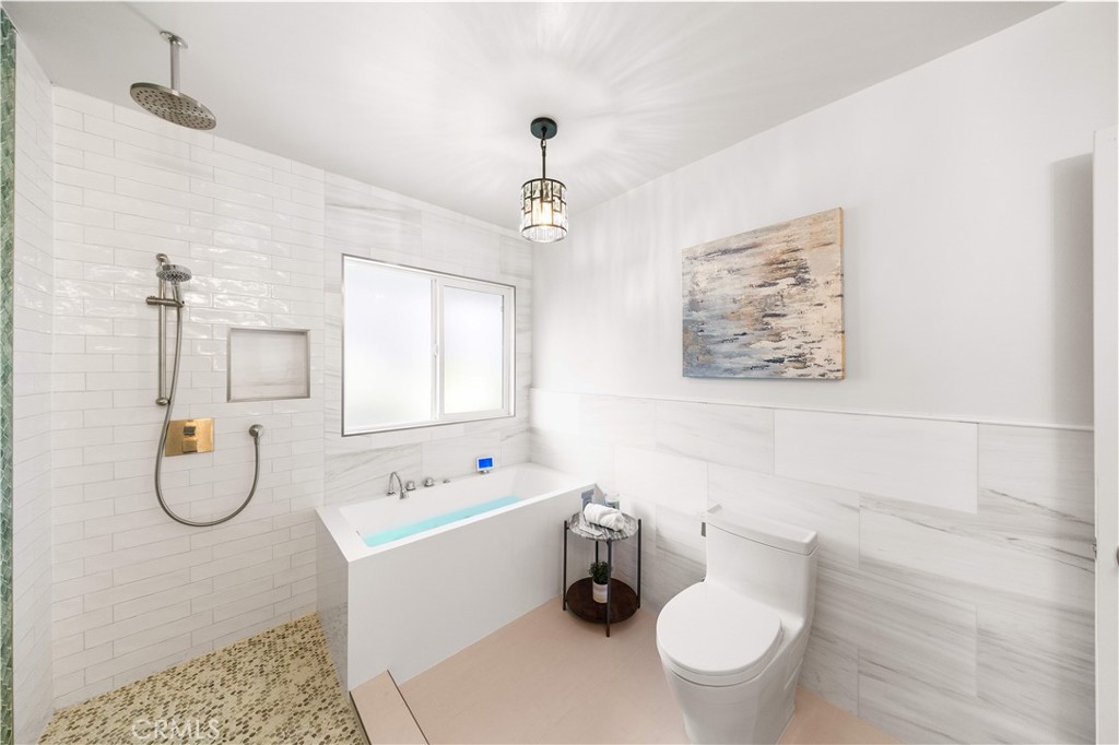 240 Longley Way Arcadia, CA 91007 - Photo 28 of 50 a bathroom with a sink a toilet and a mirror