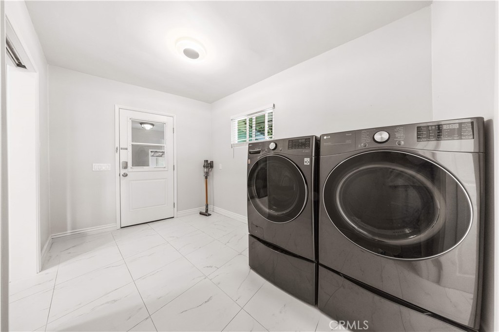 240 Longley Way Arcadia, CA 91007 - Photo 37 of 50 a view of a storage & utility room with washer and dryer