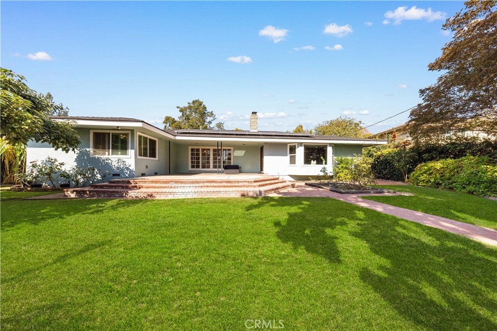 240 Longley Way Arcadia, CA 91007 - Photo 45 of 50 a front view of a house with garden and trees