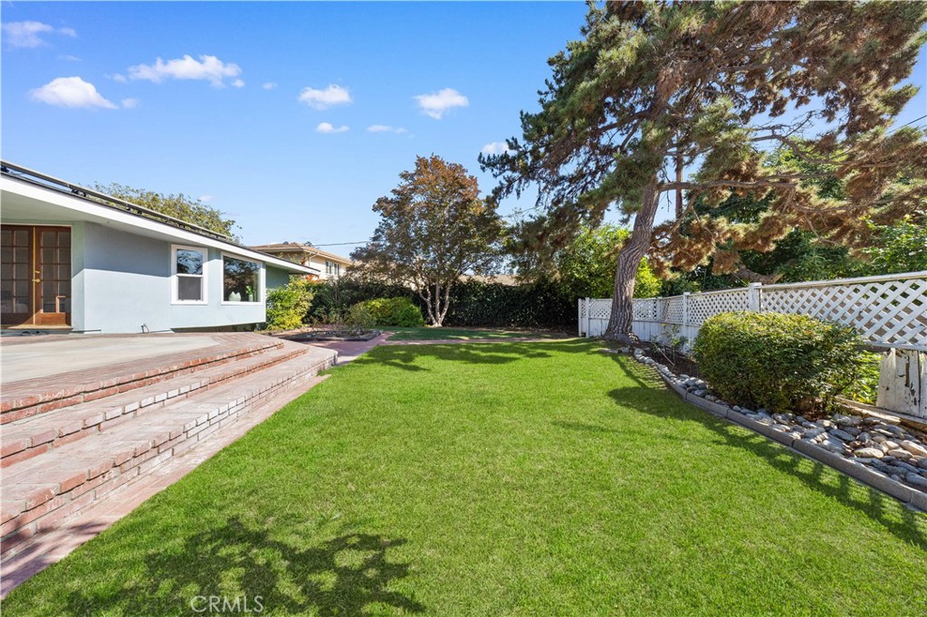 240 Longley Way Arcadia, CA 91007 - Photo 47 of 50 a view of a backyard with plants and a patio