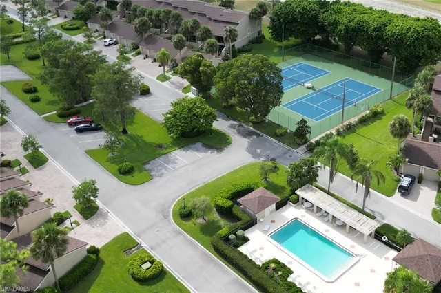 an aerial view of a house with a garden