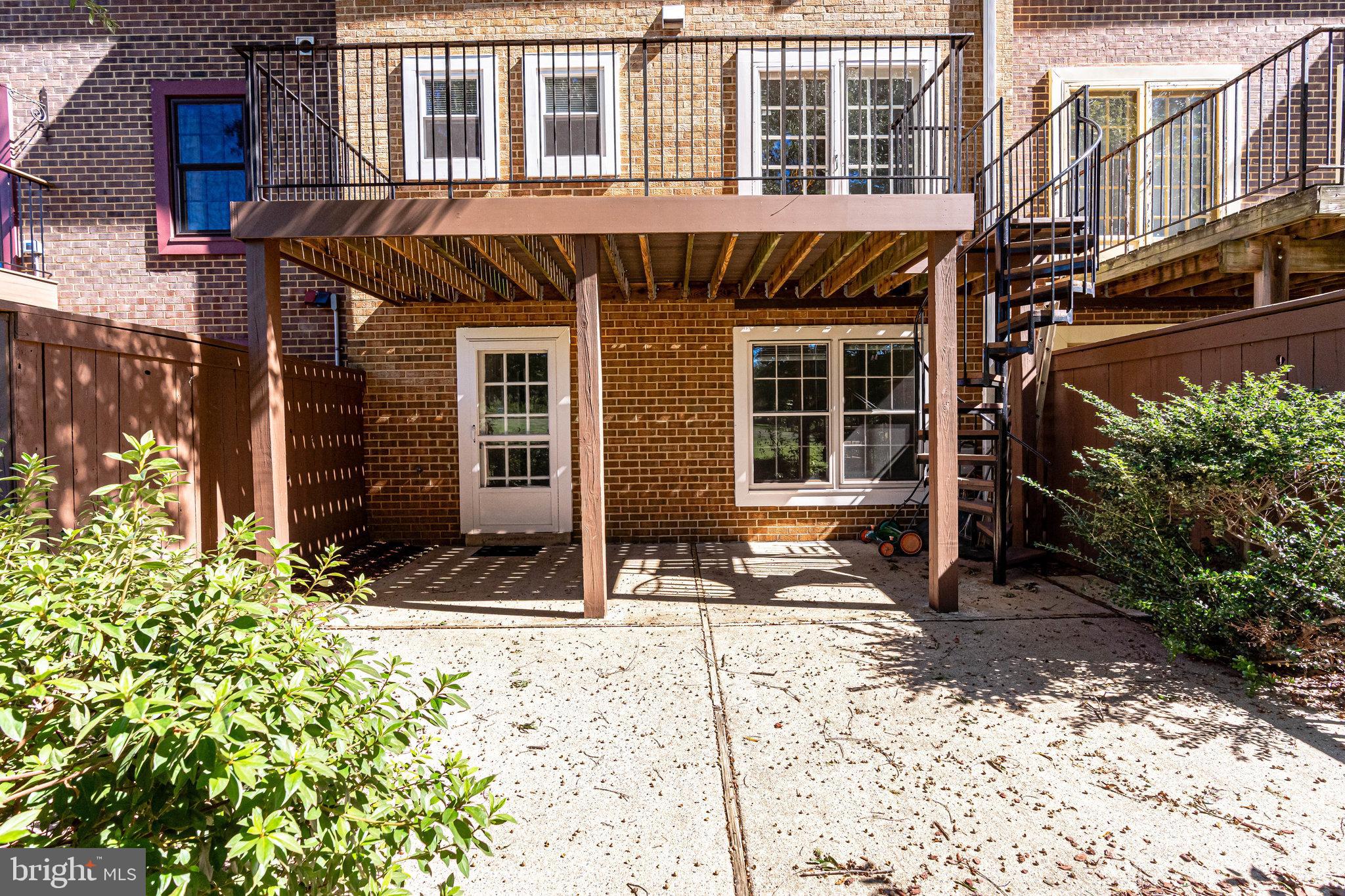 2186 Golf Course Drive Reston, VA 20191 - Photo 28 of 36 a front view of a house with a porch