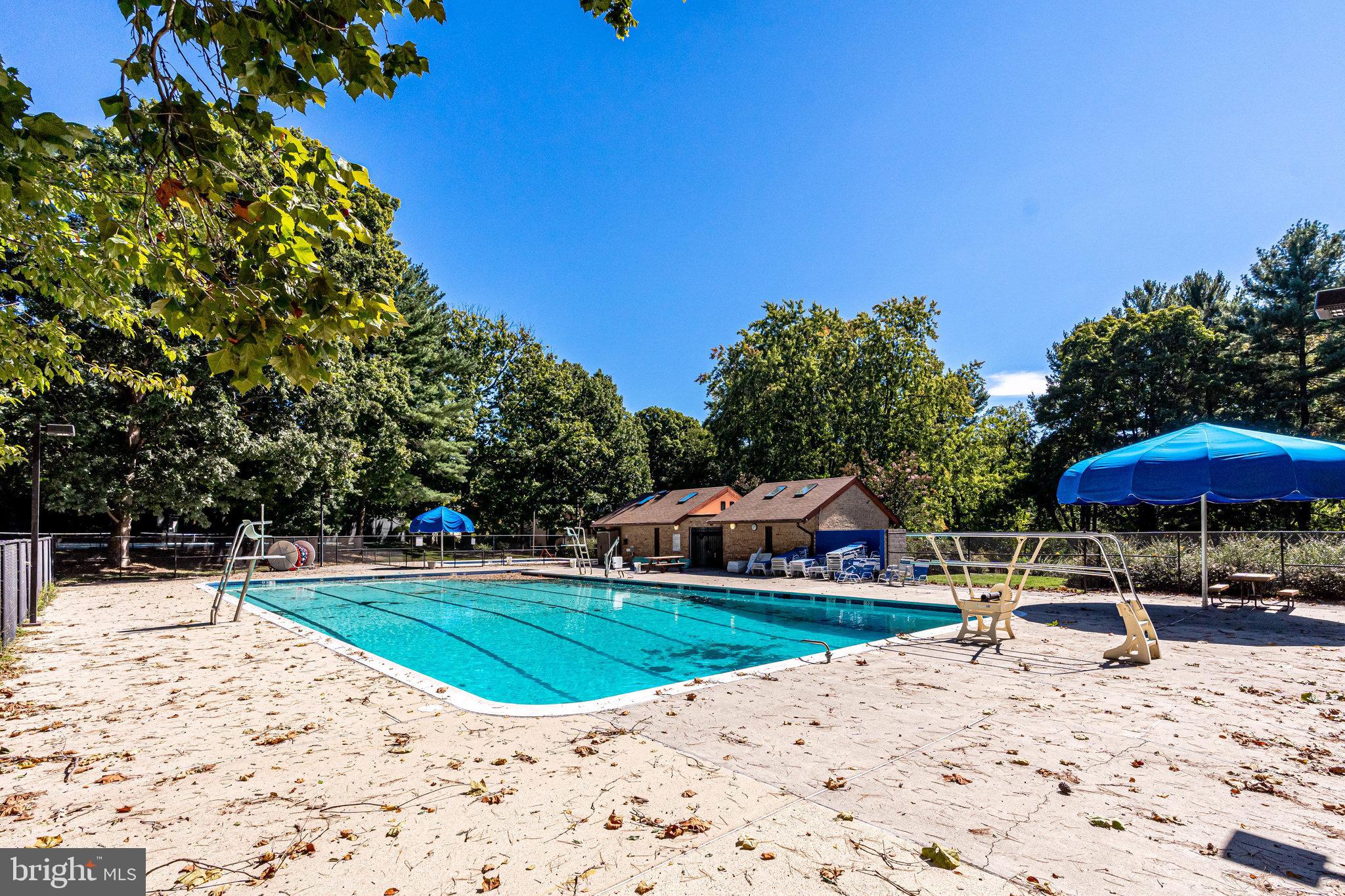 2186 Golf Course Drive Reston, VA 20191 - Photo 31 of 36 a view of a swimming pool with a lounge chair
