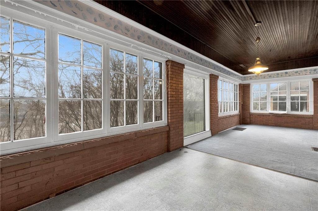 631 Riverview Road Freedom, PA 15042 - Photo 13 of 43 a view of an empty room with a large window