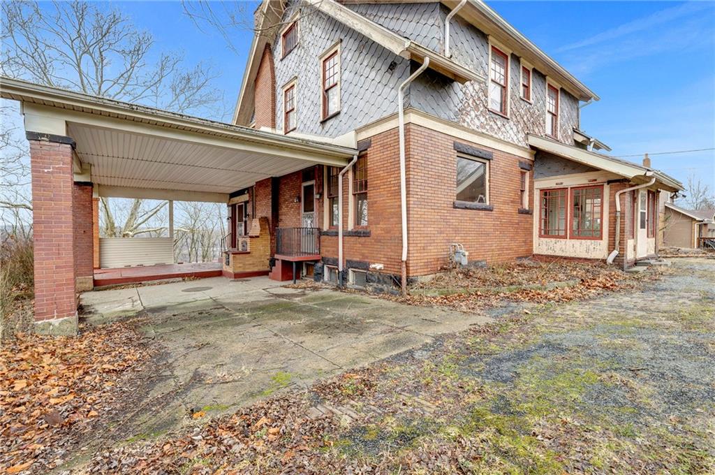 631 Riverview Road Freedom, PA 15042 - Photo 2 of 43 a view of a house with a outdoor space