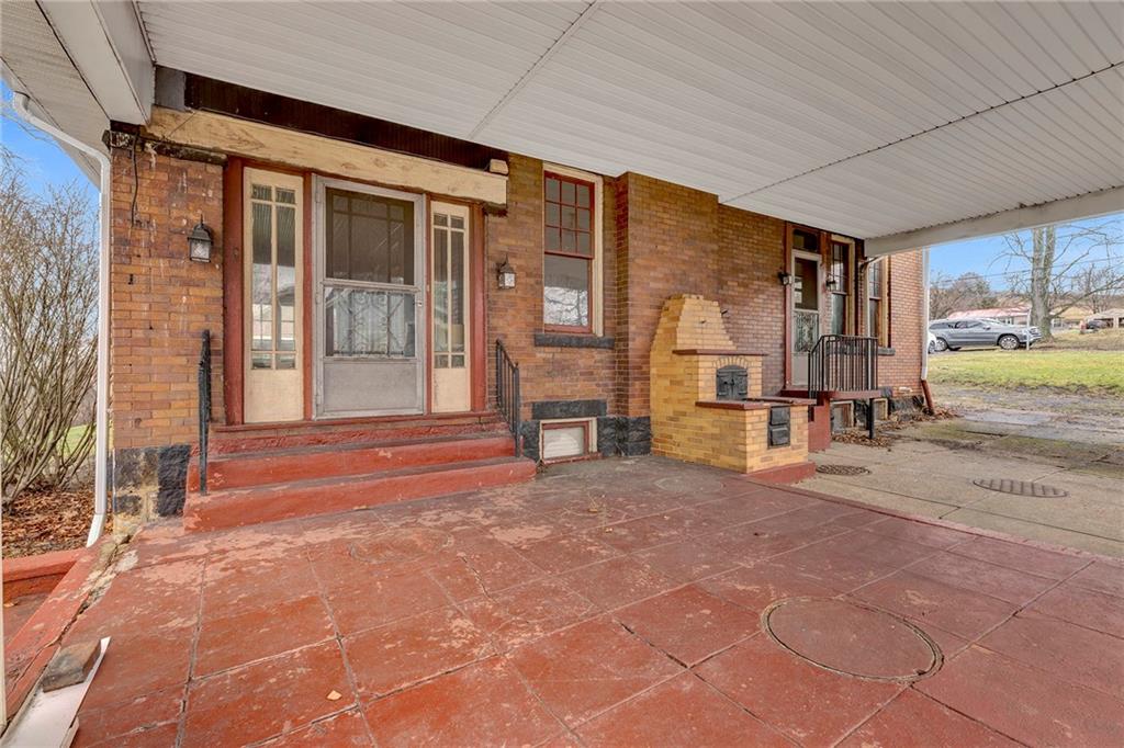 631 Riverview Road Freedom, PA 15042 - Photo 30 of 43 a view of a house with a outdoor space