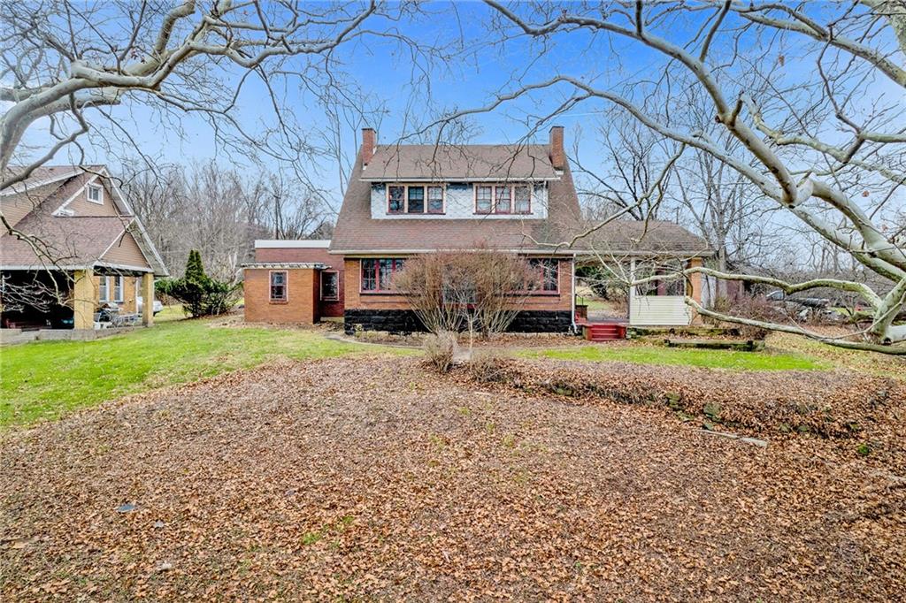 631 Riverview Road Freedom, PA 15042 - Photo 31 of 43 a view of a house with a yard and sitting area