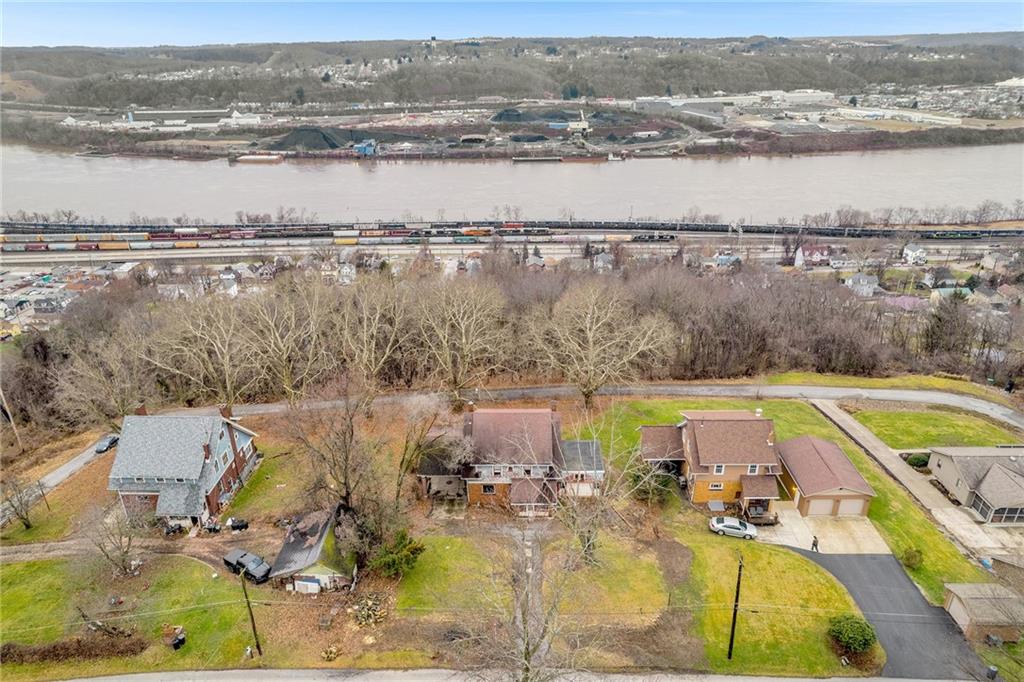 631 Riverview Road Freedom, PA 15042 - Photo 38 of 43 a view of a lake with a mountain view