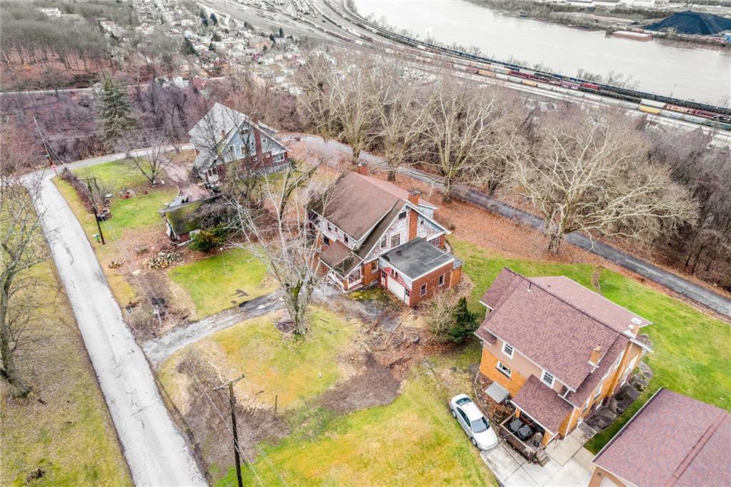 631 Riverview Road Freedom, PA 15042 - Photo 39 of 43 an aerial view of residential house with swimming pool