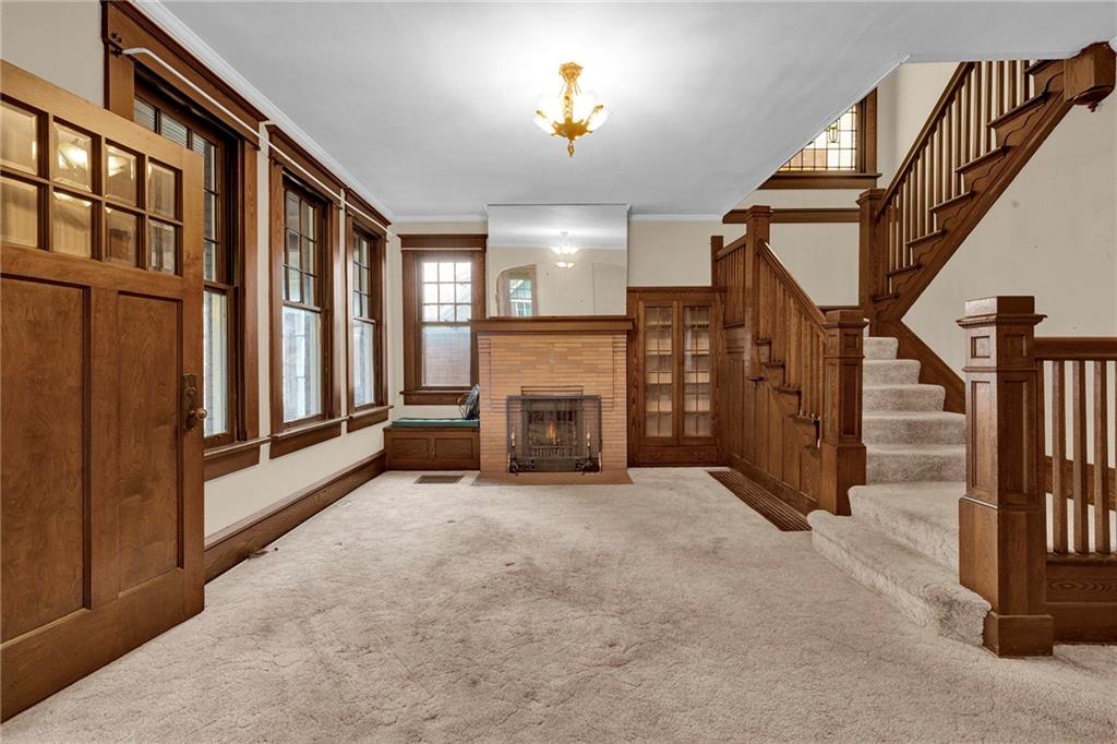 631 Riverview Road Freedom, PA 15042 - Photo 4 of 43 wooden floor with an entryway and fireplace