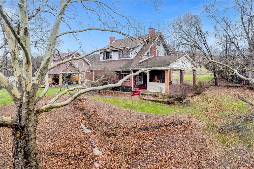 631 Riverview Road Freedom, PA 15042 - Photo 41 of 43 a view of a house with a yard and sitting area