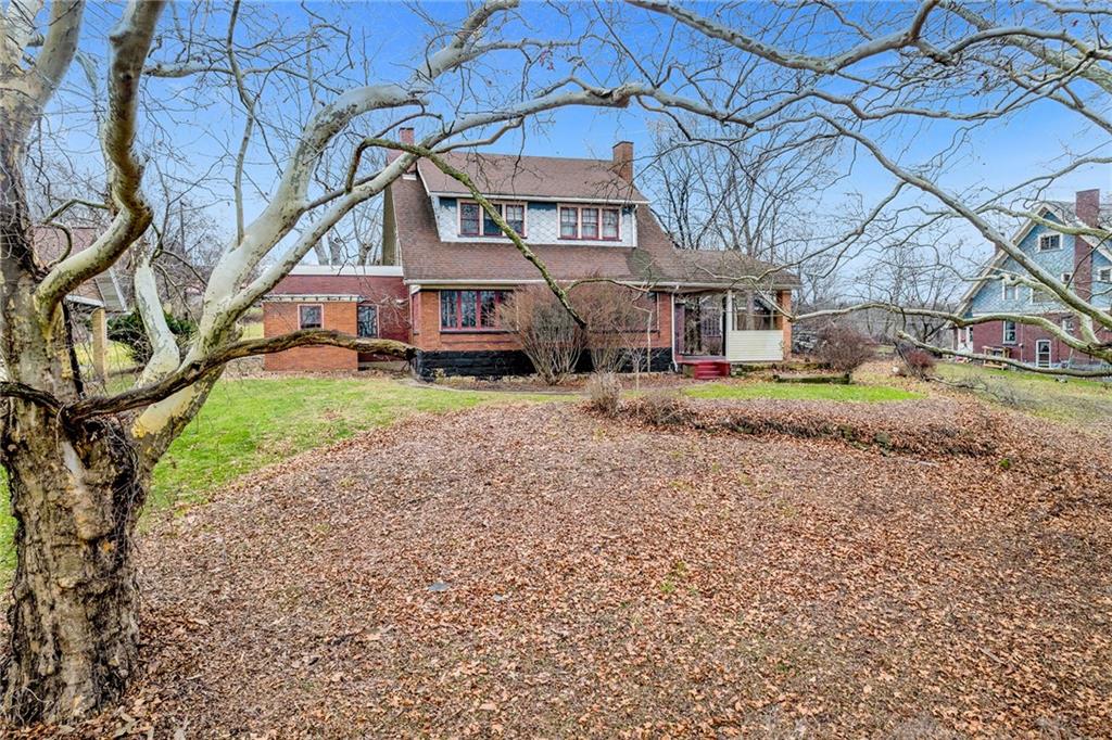 631 Riverview Road Freedom, PA 15042 - Photo 42 of 43 a house view with a garden space