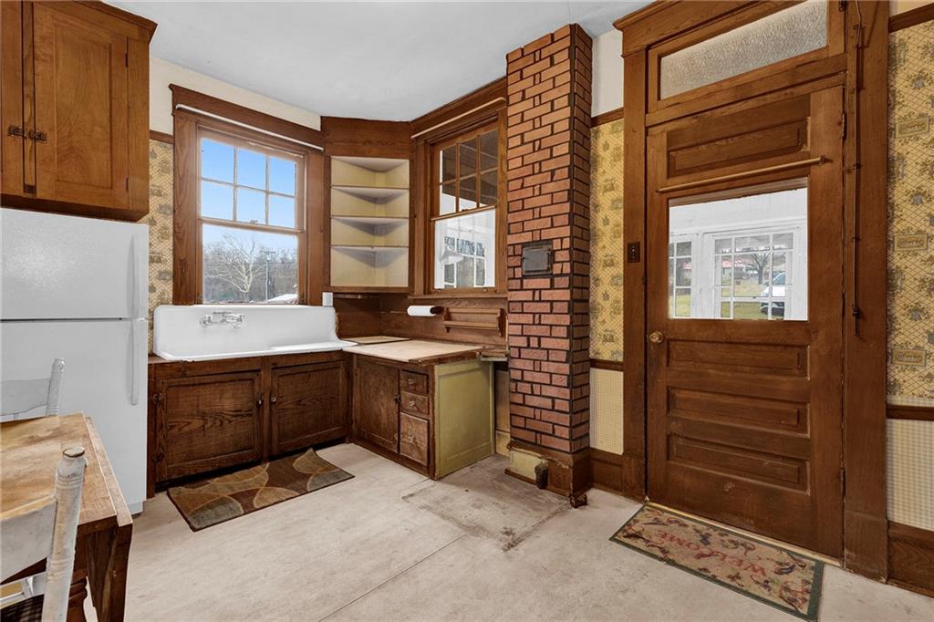 631 Riverview Road Freedom, PA 15042 - Photo 6 of 43 a room with a bed and a window