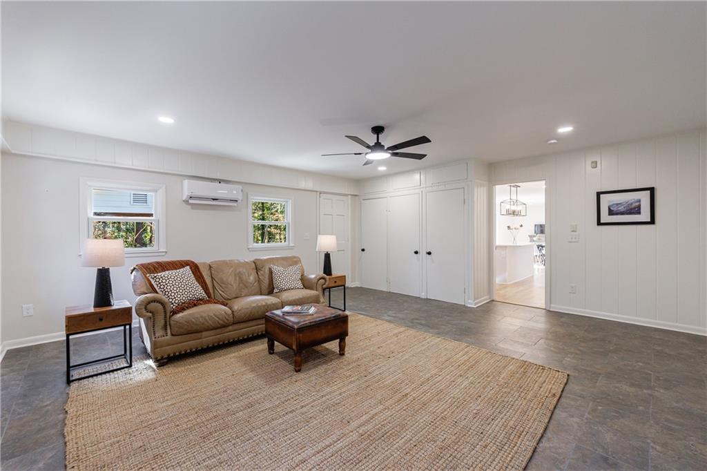 2996 Arrowood Drive East Point, GA 30344 - Photo 23 of 63 a living room with furniture and wooden floor