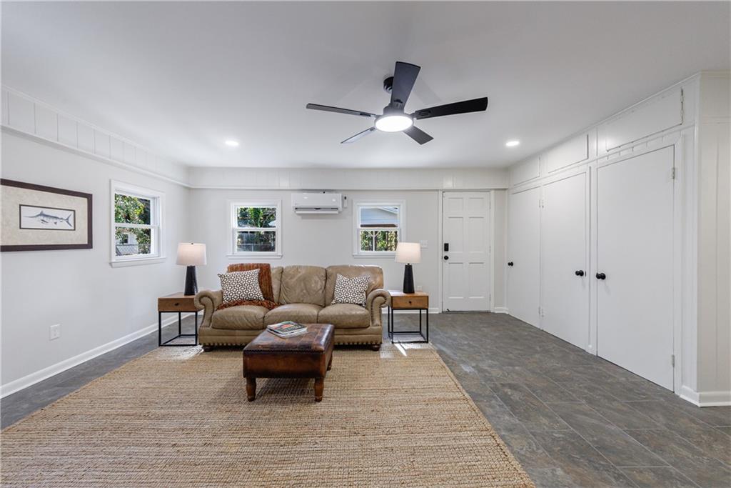 2996 Arrowood Drive East Point, GA 30344 - Photo 25 of 63 a living room with furniture and a ceiling fan