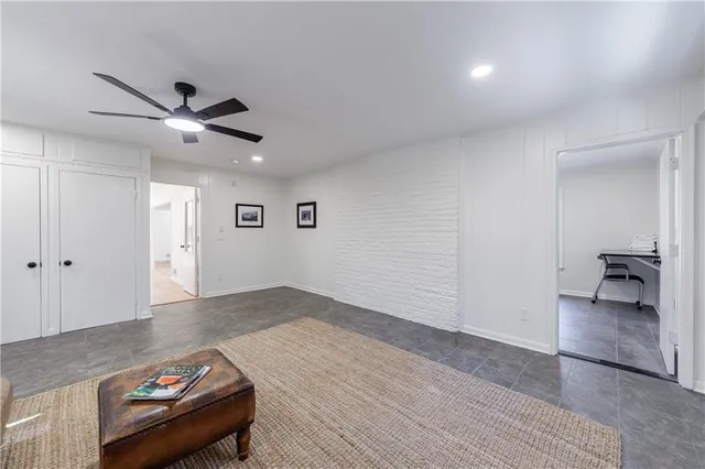 a bathroom with a shower curtain and a shower curtain