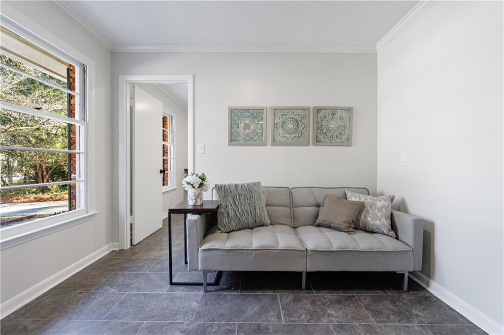 2996 Arrowood Drive East Point, GA 30344 - Photo 29 of 63 a living room with furniture and a window