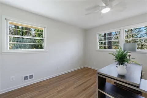 a bathroom with a shower and a bathtub