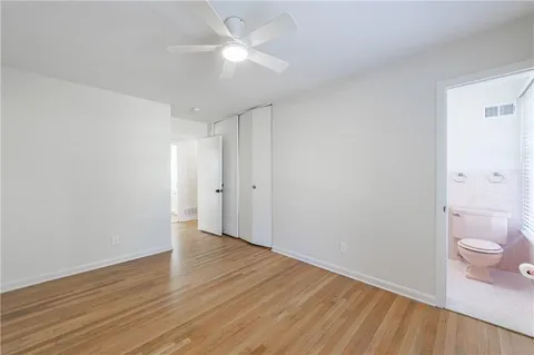 a view of a house with pool and sitting area