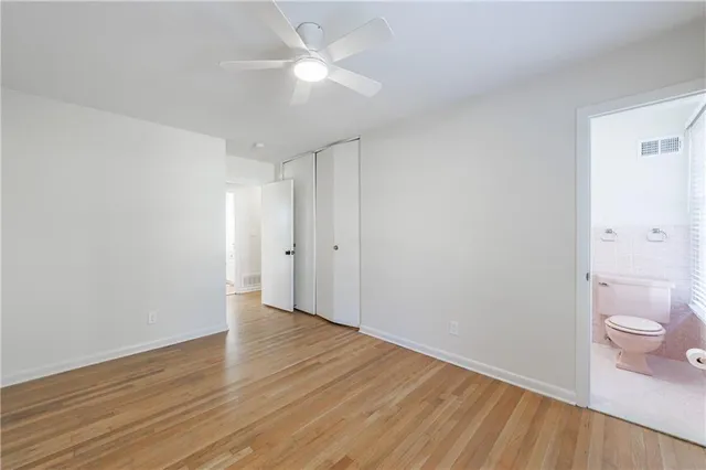 a view of a house with pool and sitting area