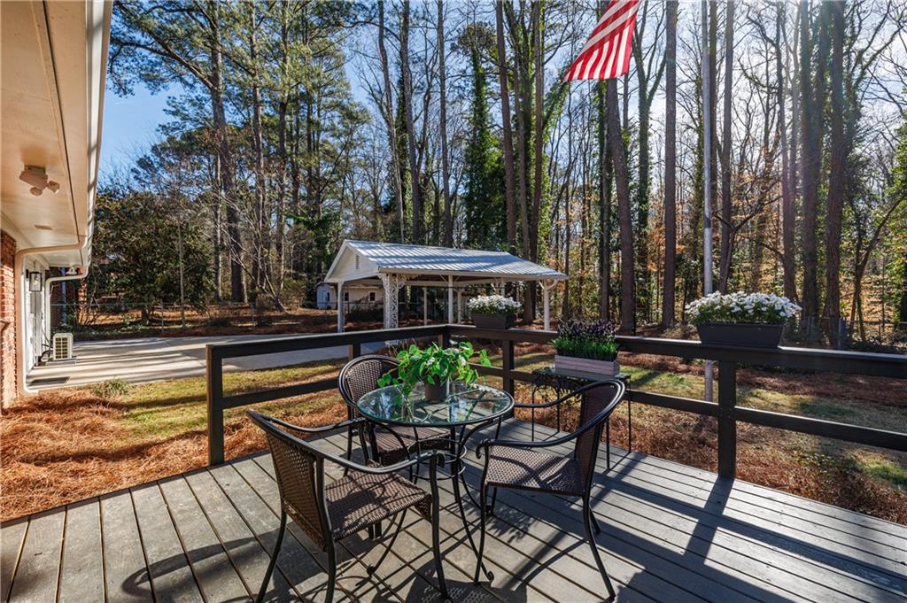 2996 Arrowood Drive East Point, GA 30344 - Photo 45 of 63 a view of a house with backyard and sitting area