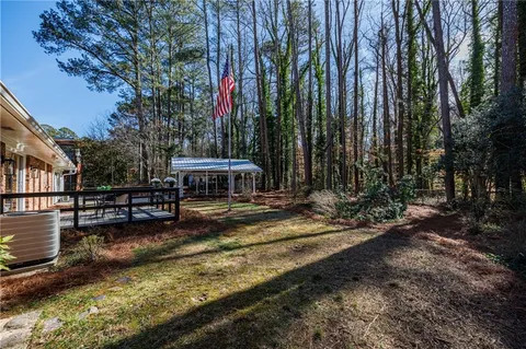 a view of outdoor space with lots of trees