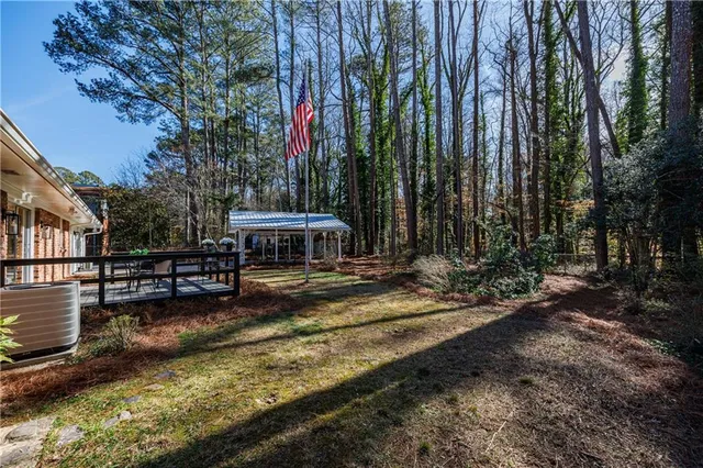 a view of outdoor space with lots of trees