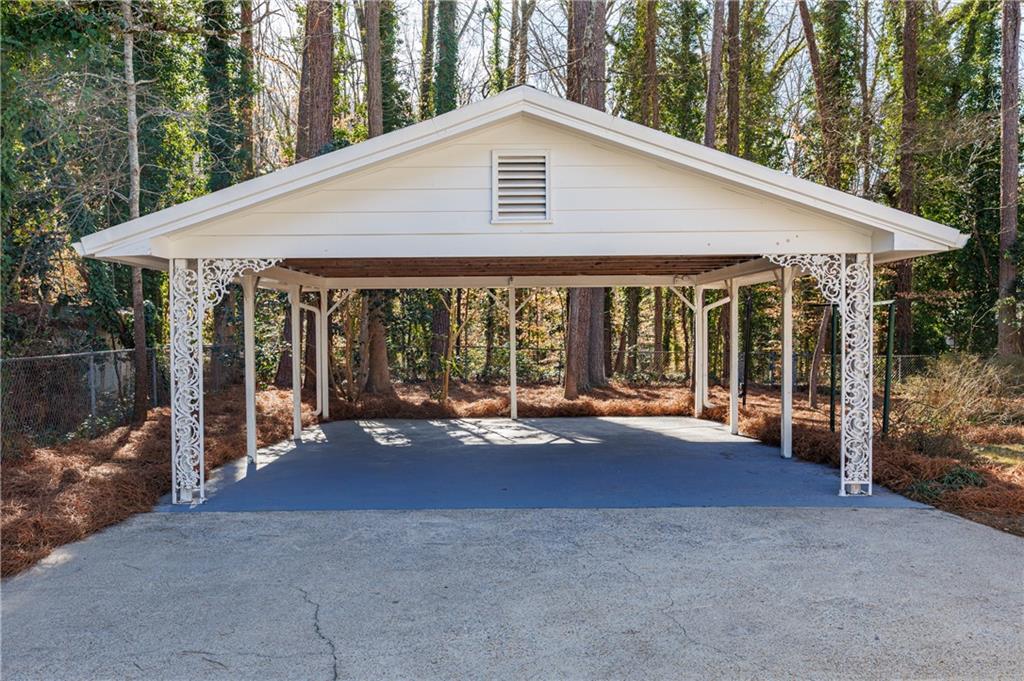 2996 Arrowood Drive East Point, GA 30344 - Photo 50 of 63 a view of a house with backyard and porch