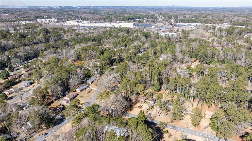2996 Arrowood Drive East Point, GA 30344 - Photo 63 of 63 an aerial view of residential houses with outdoor space and trees